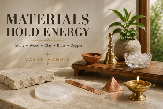 Natural materials in Vastu home setup with stone base, wooden tray, clay diya, brass bell, copper remedy, crystal bowl, selenite plate, and plant.