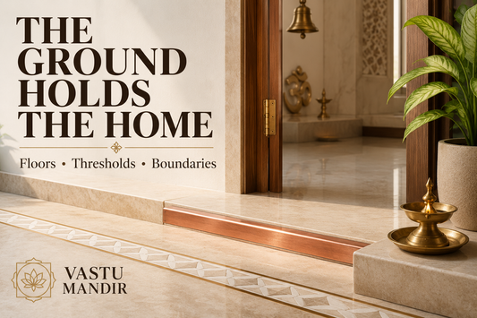 Vastu entrance floor and threshold with marble inlay, clean doorway, copper strip, brass diya, sacred symbol, and healthy plant in a modern Indian home.