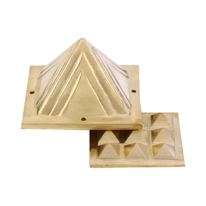 Two-layer brass Vastu pyramid shown with the upper and lower sections offset on a white background