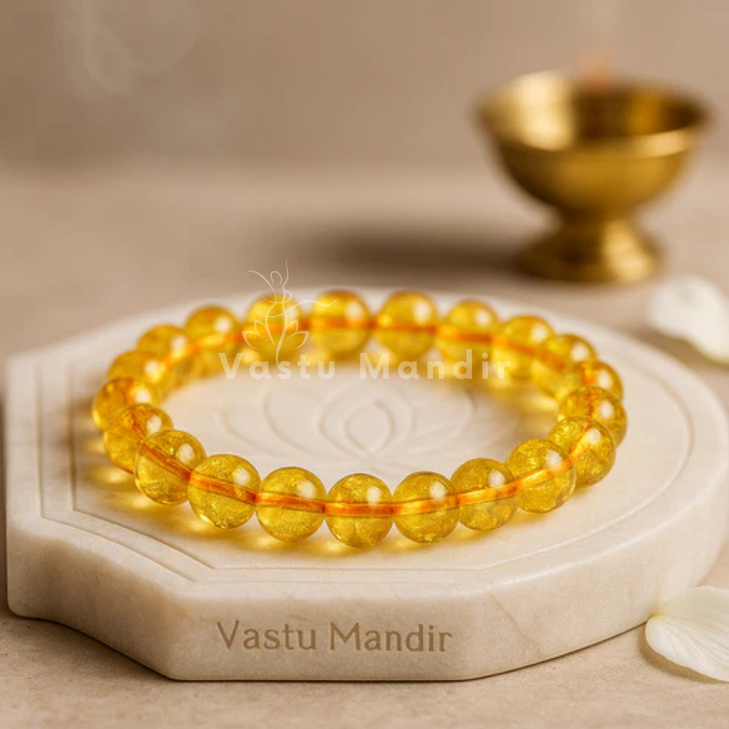 Hydro citrine crystal bracelet shown in a second hand-held product view