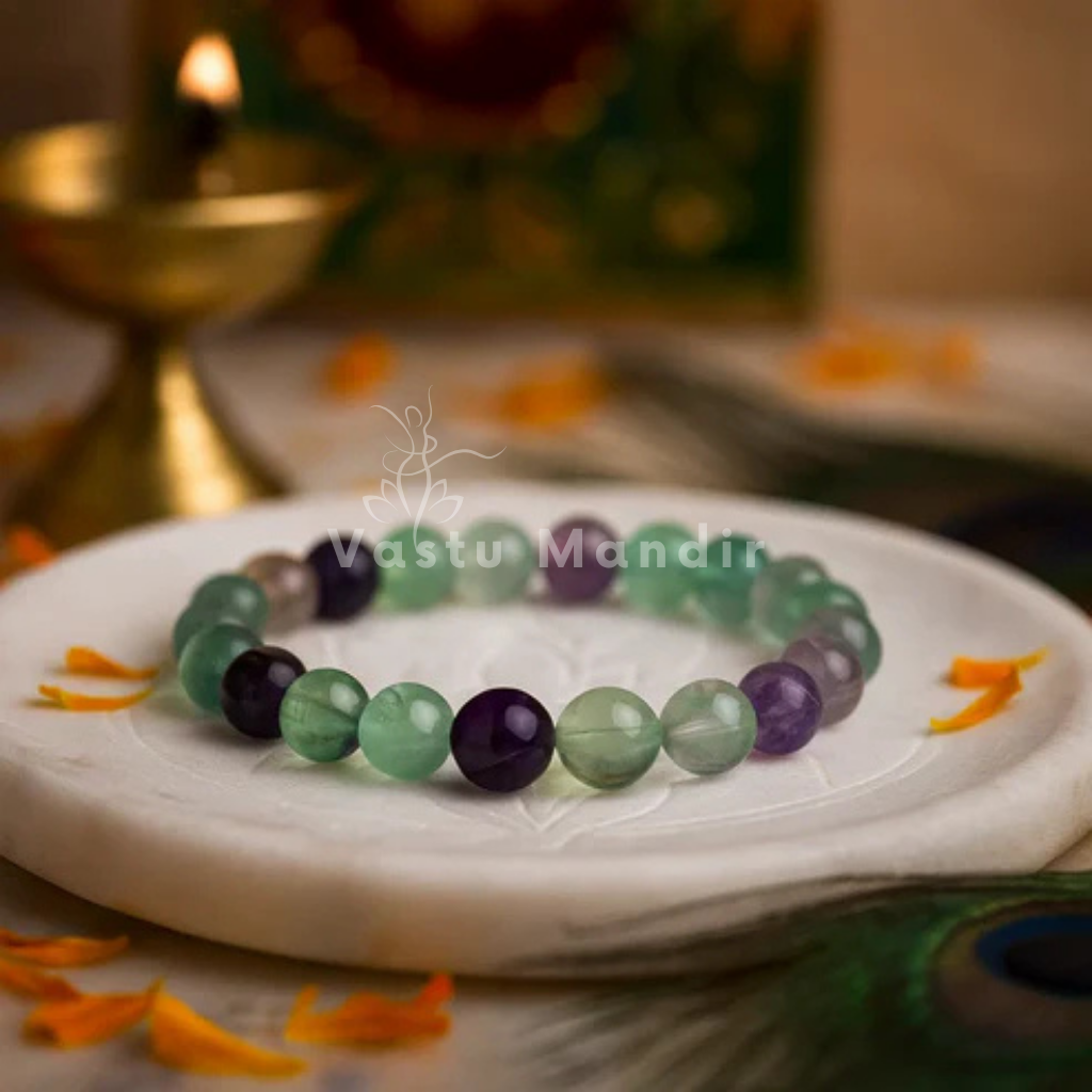 Natural fluorite crystal bracelet shown with a hand in a lifestyle photograph