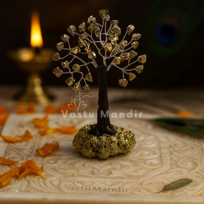 Golden pyrite crystal bonsai tree on wooden base used for North Zone Vastu correction and cash flow stabilization.

