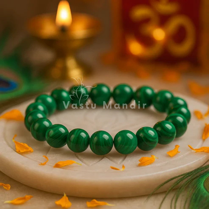 Natural green jade crystal bracelet shown in a separate hand-held product photograph