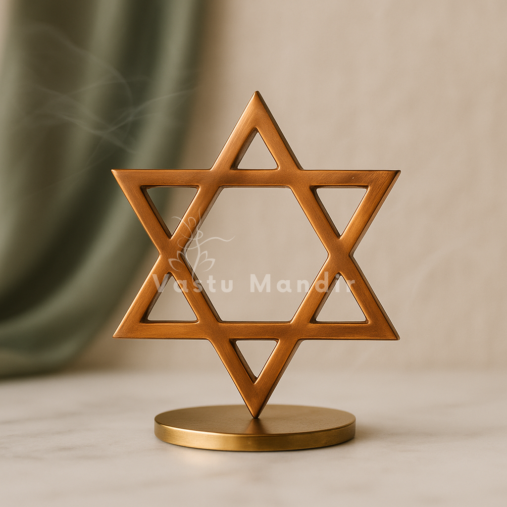 Copper star helix displayed upright on a round brass stand