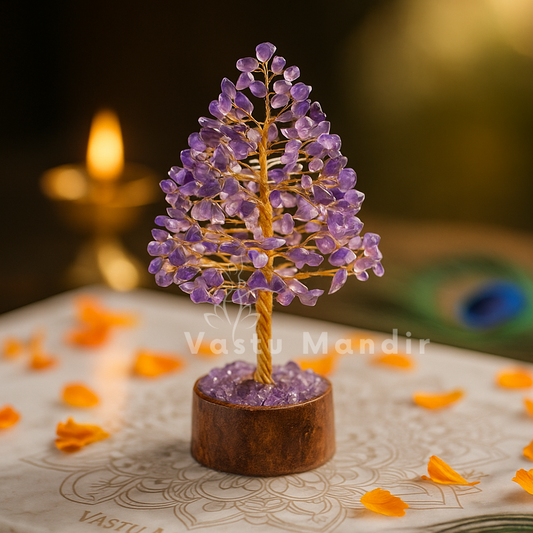 Amethyst crystal tree displayed in a dark, softly lit spiritual setting