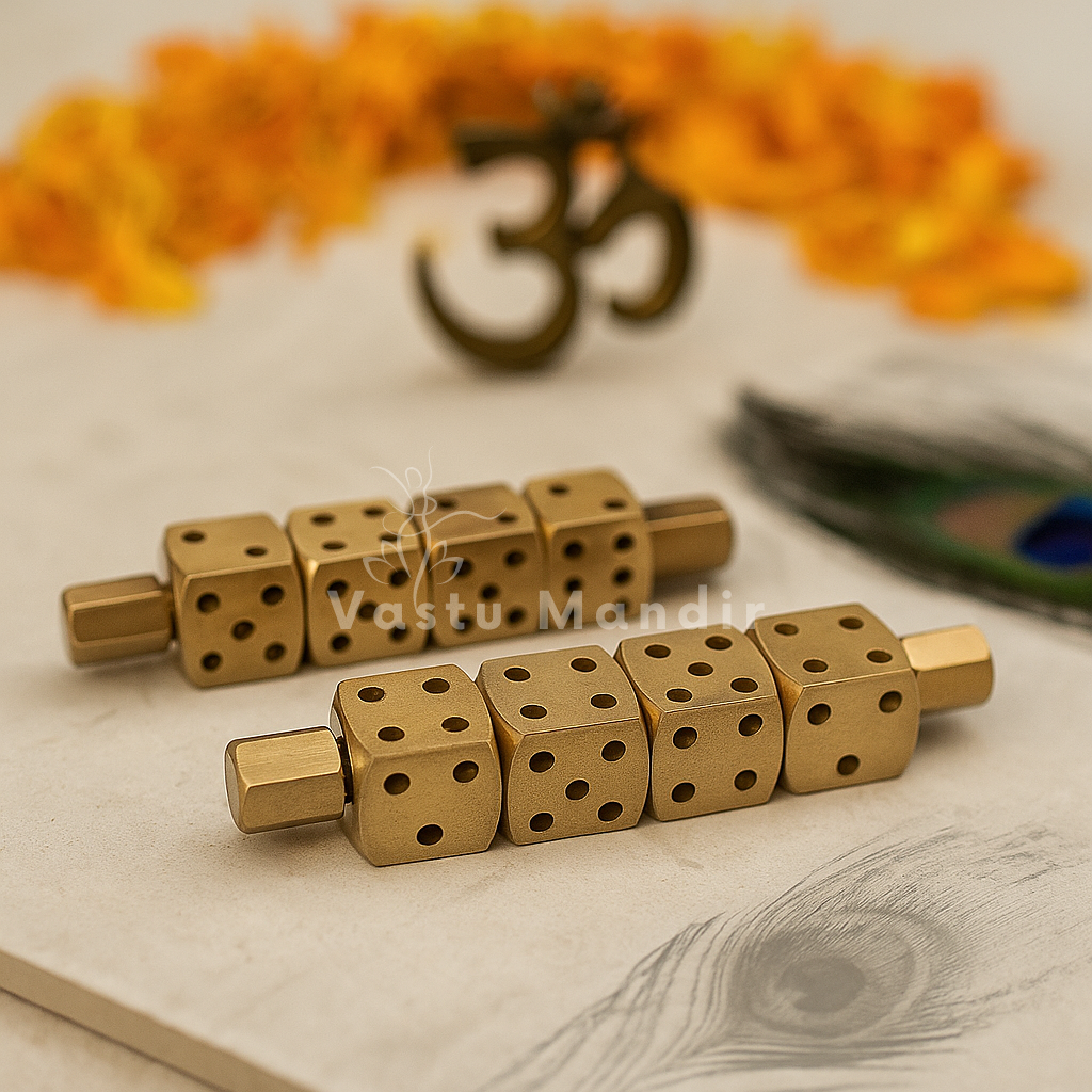 Pair of brass Ramal Pass rods displayed with Om symbol and peacock feather