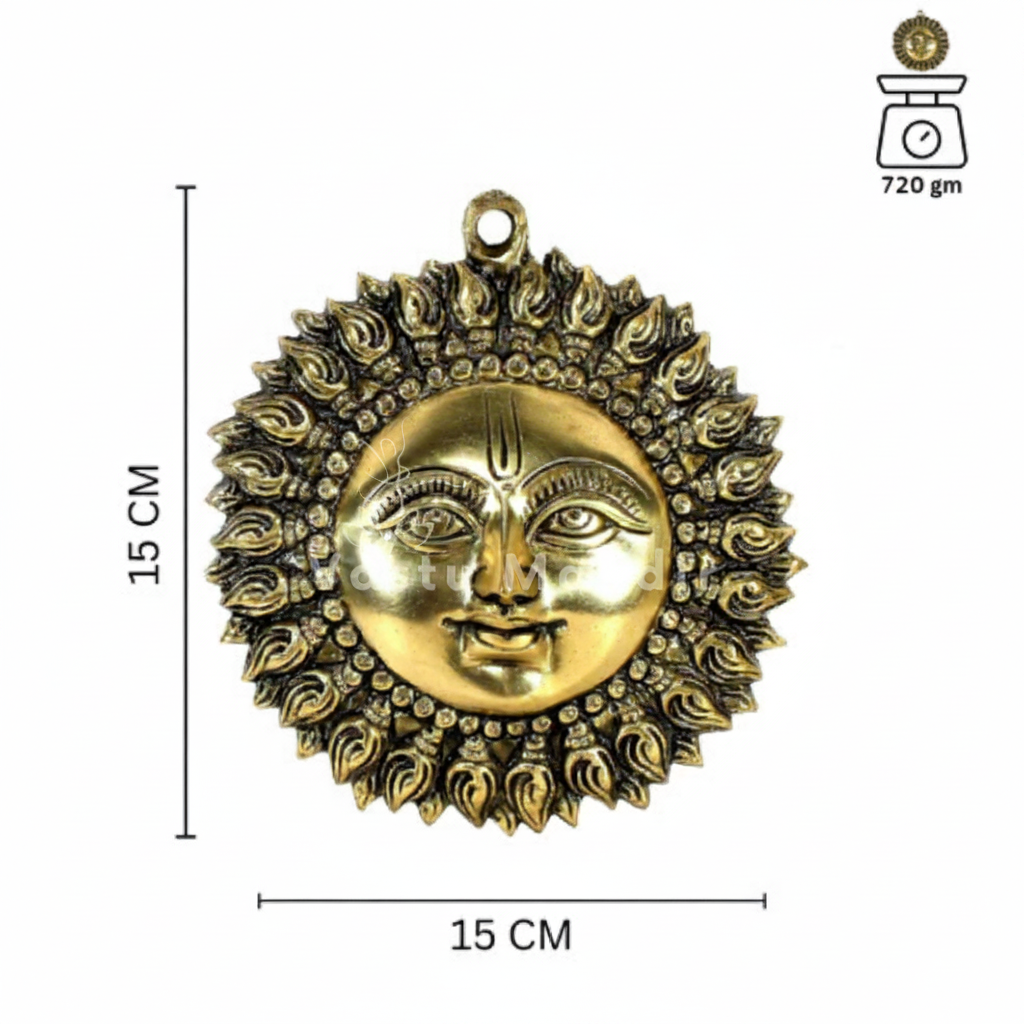 Brass surya (sun) ji wall hanging idol Vastu remedy in a close-up view against a clean white background