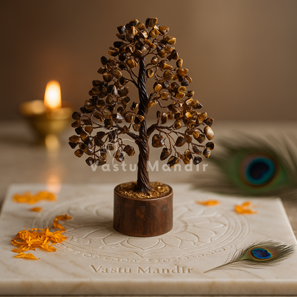Tiger eye crystal tree displayed in a dark, softly lit spiritual setting