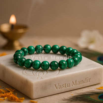 Natural malachite crystal bracelet shown with a hand in a lifestyle photograph