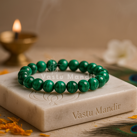 Natural malachite crystal bracelet shown with a hand in a lifestyle photograph