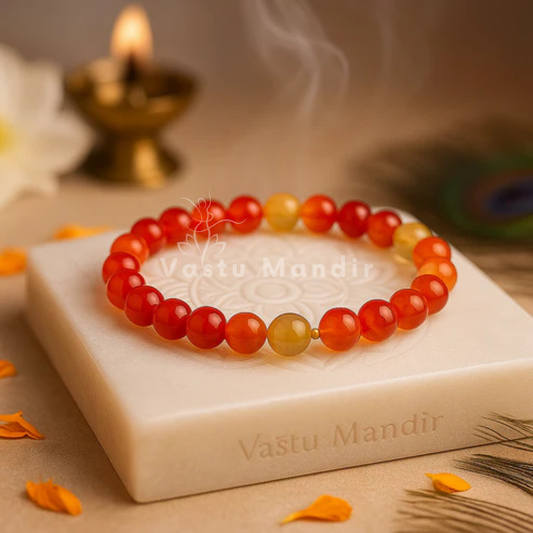 Natural red agate crystal bracelet shown with a hand in a lifestyle photograph