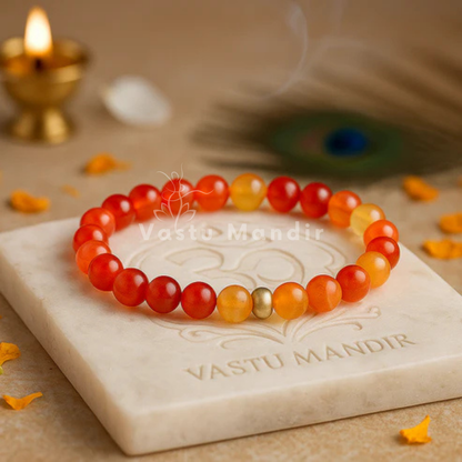 Natural red agate crystal bracelet shown in a second hand-held product view