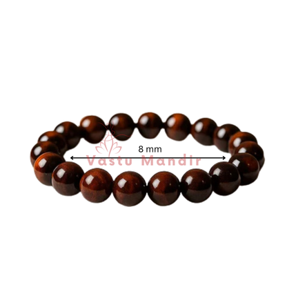 Natural red tiger eye crystal bracelet centred in a clean product photograph