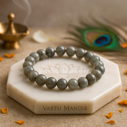 Natural labradorite crystal bracelet shown in a second hand-held product view