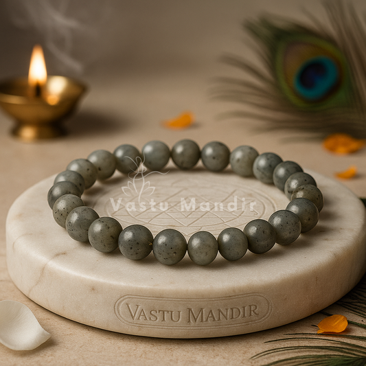 Natural labradorite crystal bracelet shown with a hand in a lifestyle photograph