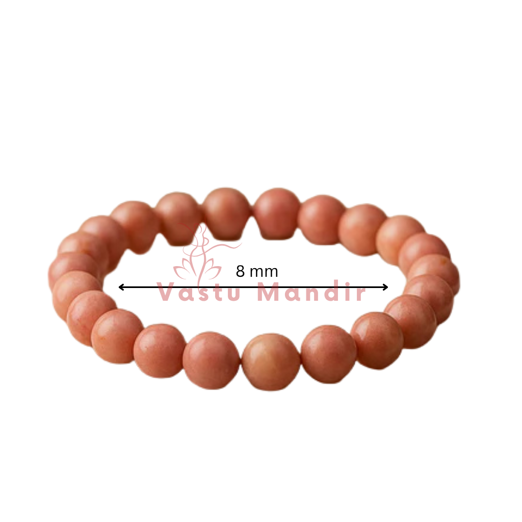 Natural Rhodochrosite Crystal Bracelet shown from a raised view on a white background