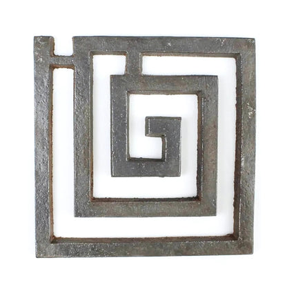 Front view of the iron square spiral helix on a clean white background