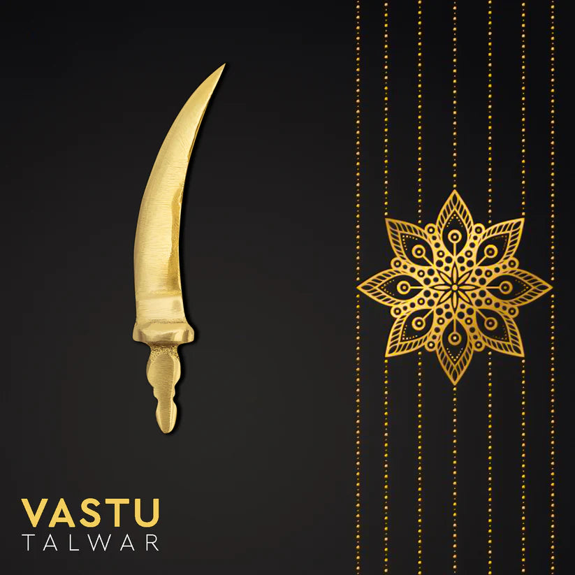 Curved brass talwar miniature single talwar presented on a black decorative card