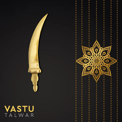 Curved brass talwar miniature single talwar presented on a black decorative card