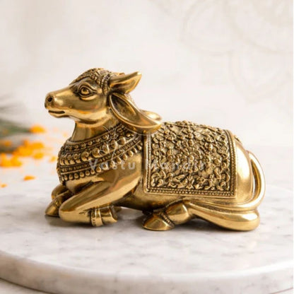 Premium brass Nandi bull idol alternate side angle on a marble platform