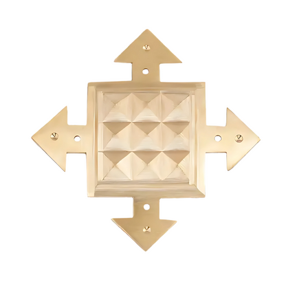 A gold-colored brass pyramid wall hanging with geometric patterns, designed for Vastu Shastra purposes.