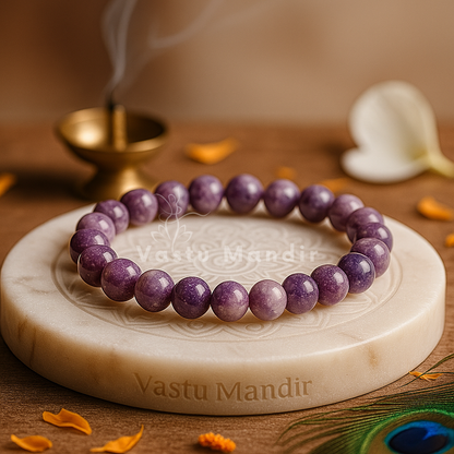 Natural lepidolite crystal bracelet shown with a hand in a lifestyle photograph