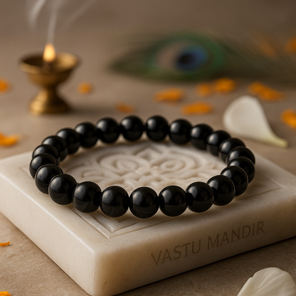 Natural hematite crystal bracelet shown in a second hand-held product view