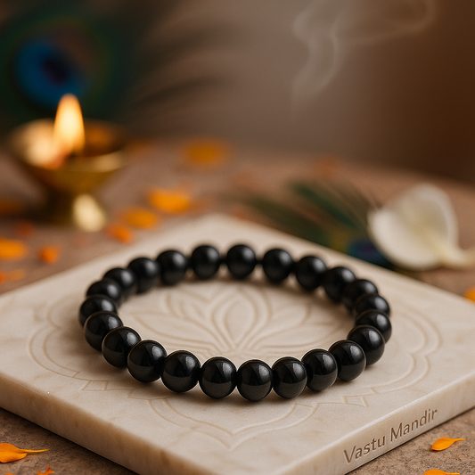 Natural hematite crystal bracelet shown with a hand in a lifestyle photograph
