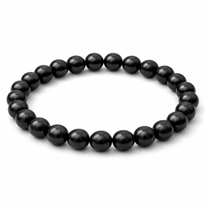 Natural black tourmaline crystal bracelet centred in a clean product photograph