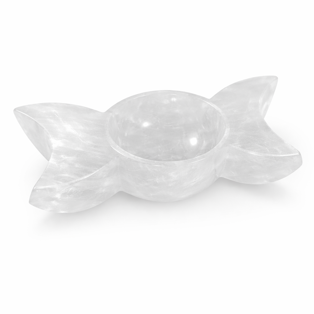Triple moon selenite charging bowl in a close product view on white