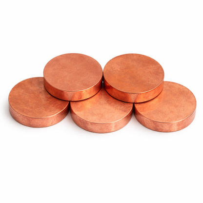Copper & brass Vastu coins in a close product view on white