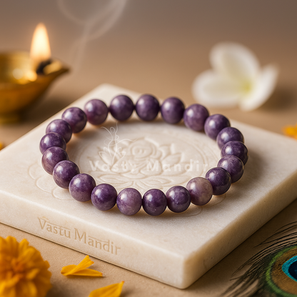 Natural lepidolite crystal bracelet shown in a second hand-held product view