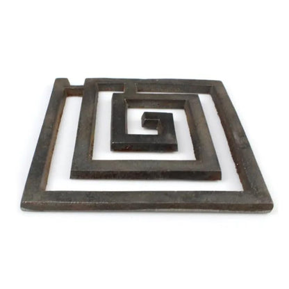 Angled view of the iron square spiral helix on a white background