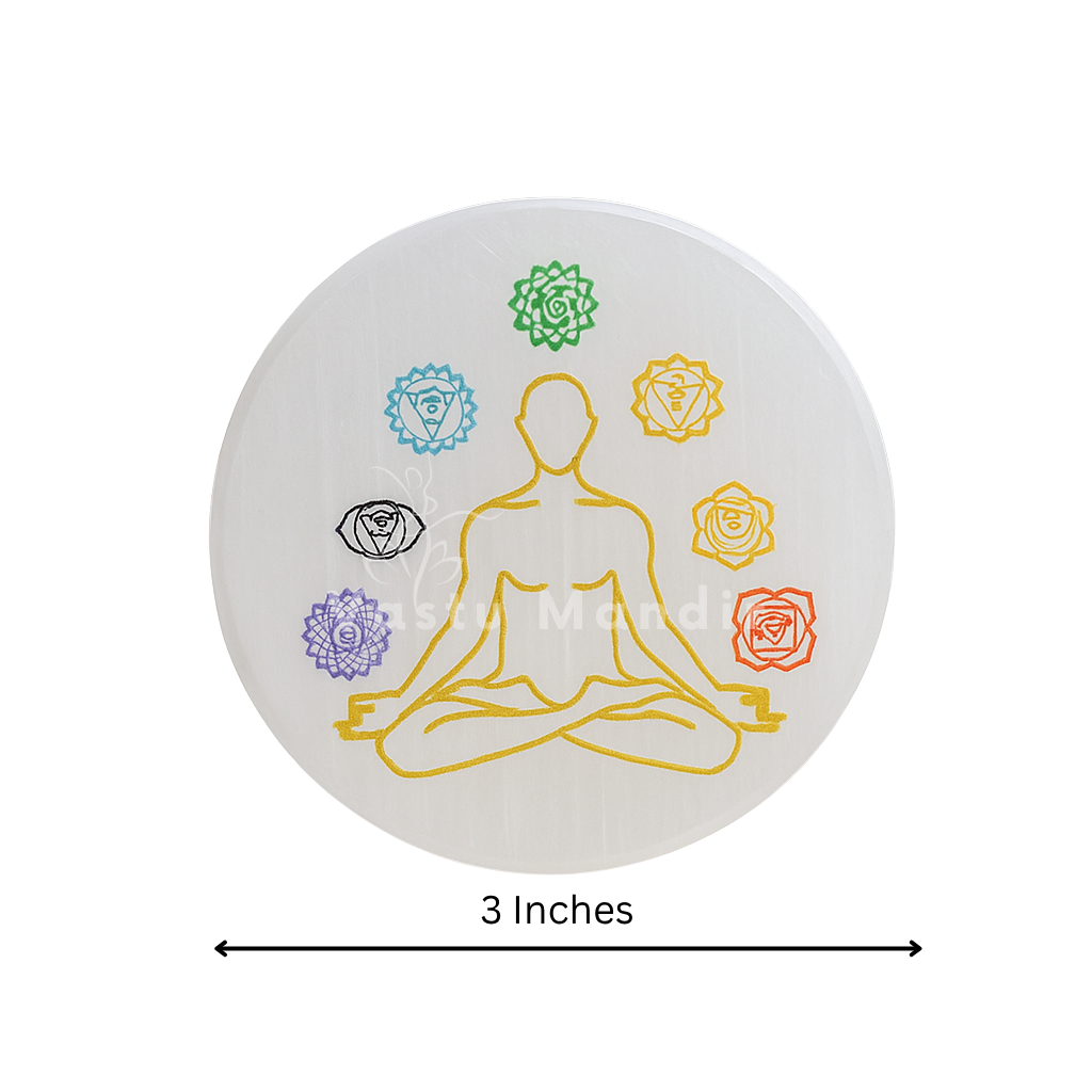 Seven chakra selenite charging plate shown with crystals for cleansing