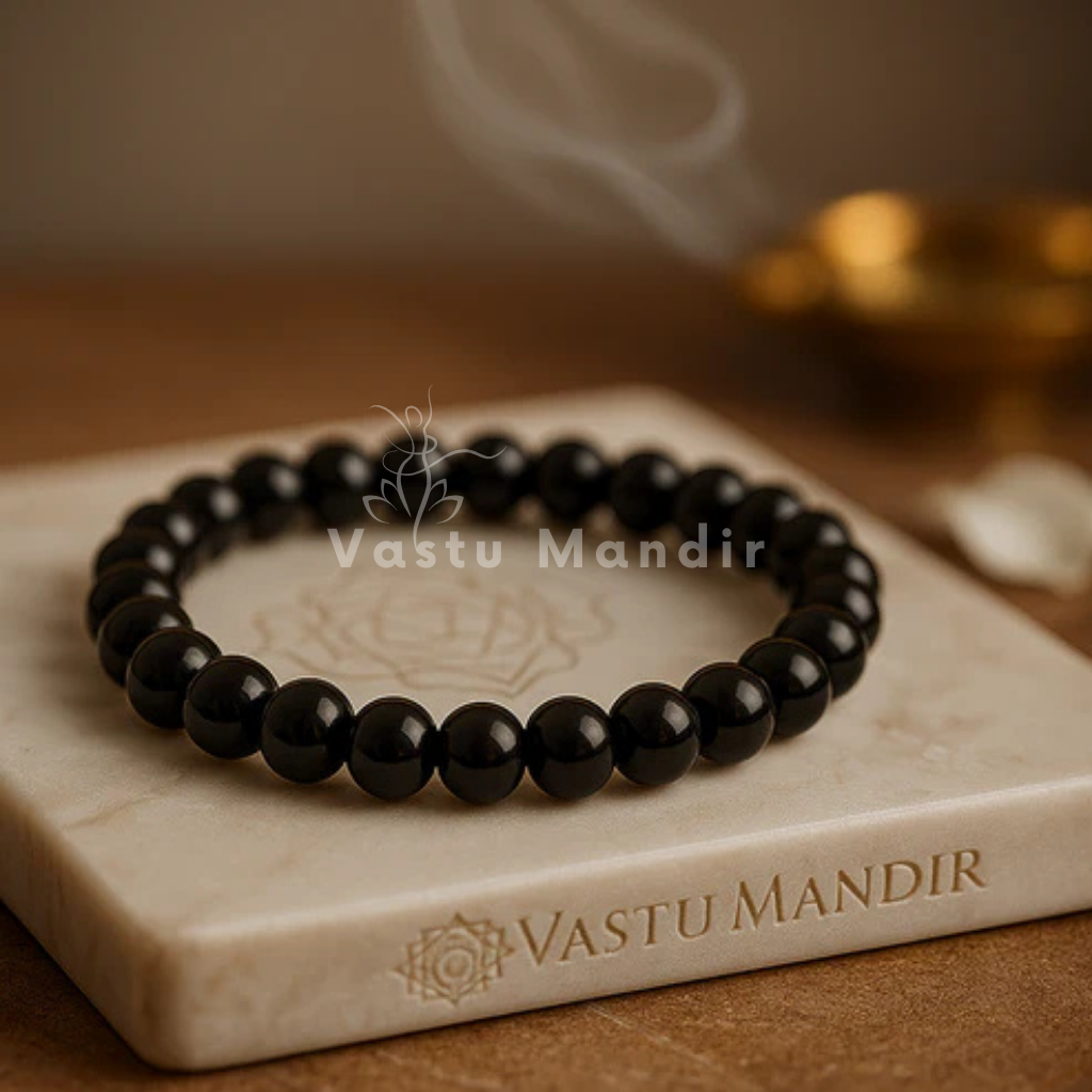 Black tourmaline hydro crystal bracelet shown with a hand in a lifestyle photograph