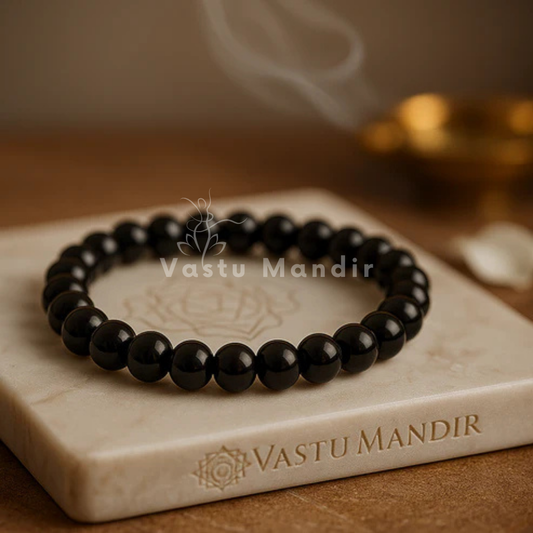 Black tourmaline hydro crystal bracelet shown with a hand in a lifestyle photograph