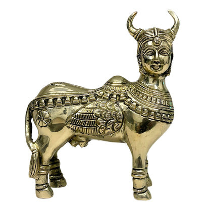 Brass Kamdhenu cow idol left-side view isolated on white background