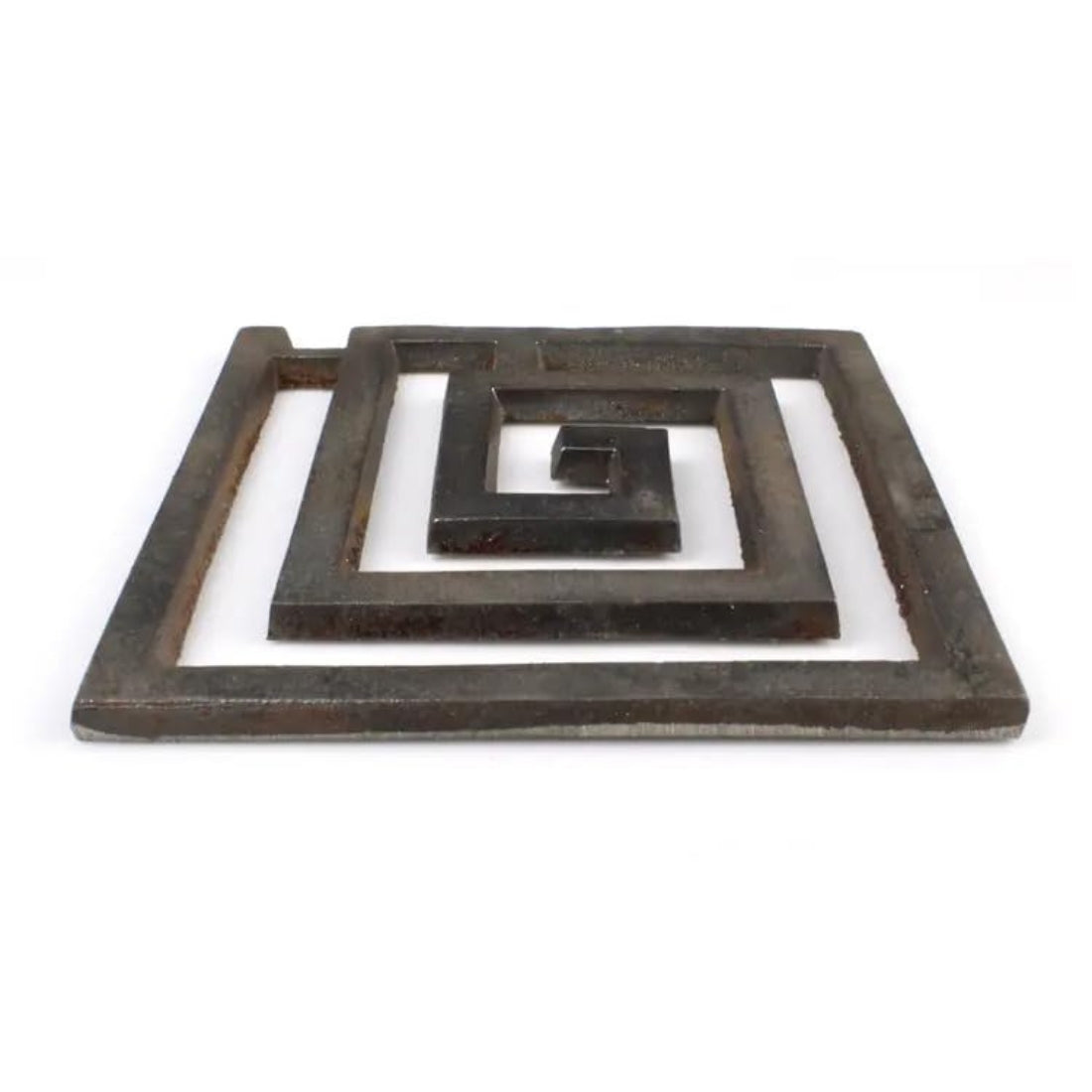 Low angled view of the iron square spiral helix on a white background
