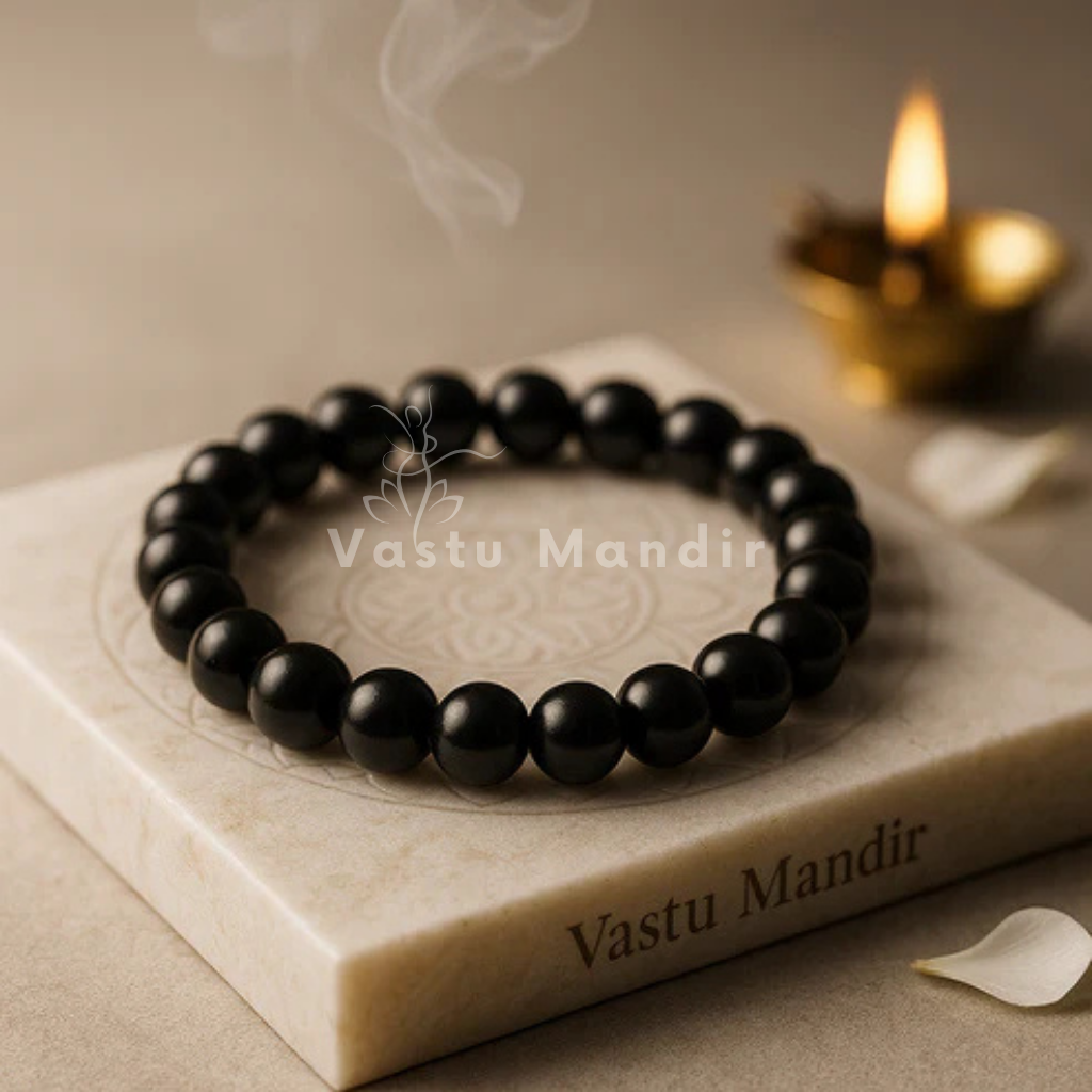 Black tourmaline hydro crystal bracelet shown in a second hand-held product view