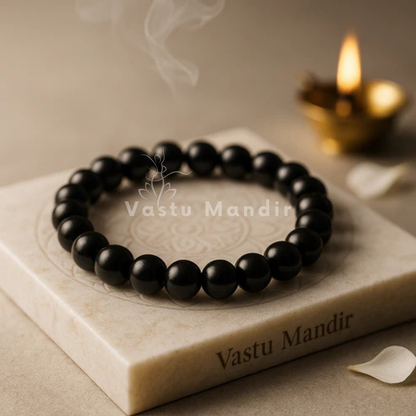 Black tourmaline hydro crystal bracelet shown in a second hand-held product view