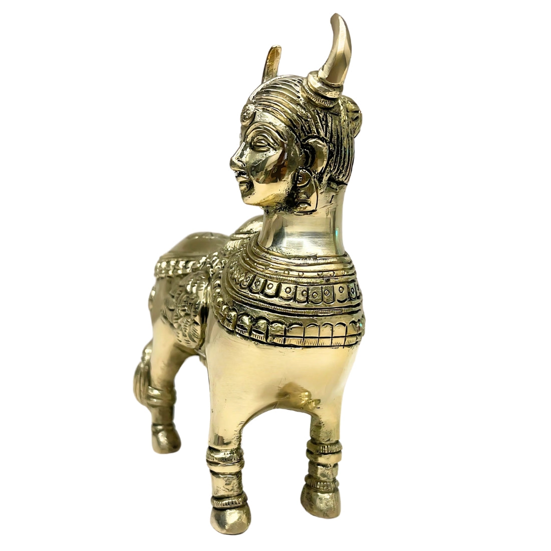 Brass Kamdhenu cow idol front three-quarter view isolated on white background