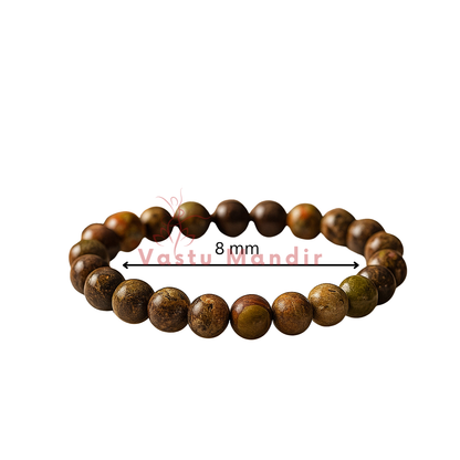 Natural fire agate crystal bracelet centred in a clean product photograph