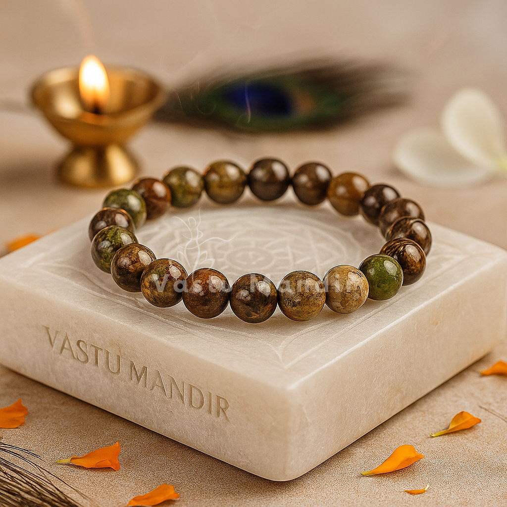 Natural fire agate crystal bracelet shown with a hand in a lifestyle photograph