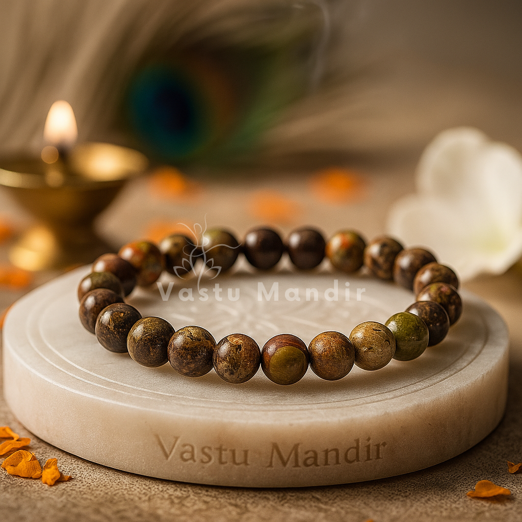 Natural fire agate crystal bracelet shown in a second hand-held product view