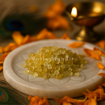 Angled close view of translucent yellow sapphire chips in a traditional setting