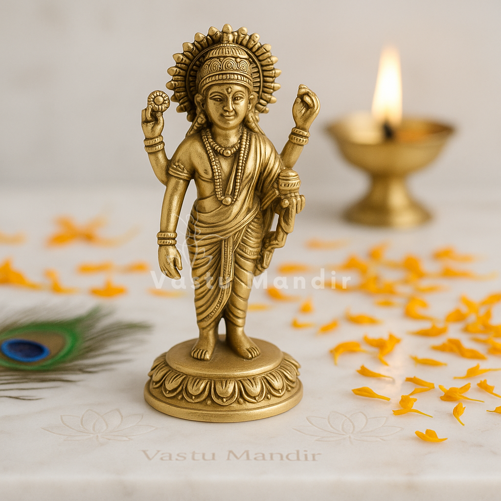 Pure brass Dhanvantri Ji idol on a sacred white plate with marigold petals and diya