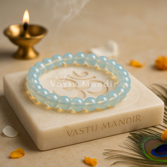 Natural opalite crystal bracelet shown with a hand in a lifestyle photograph