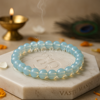 Natural opalite crystal bracelet shown in a second hand-held product view