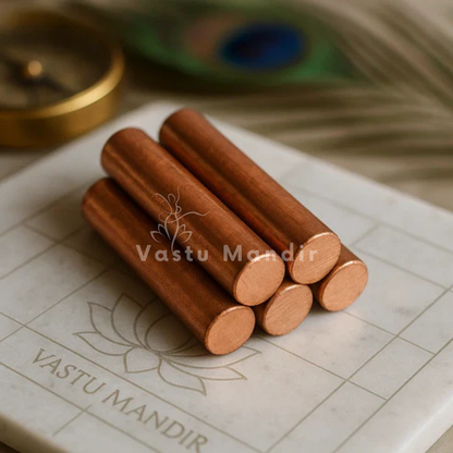 Copper round stud displayed in a dark, softly lit spiritual setting