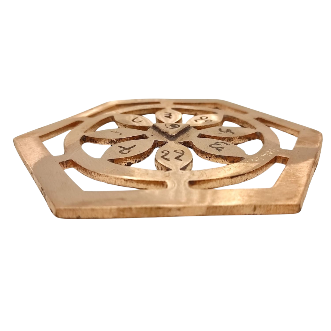 Copper bhoum yantra centred in a white-background product photograph